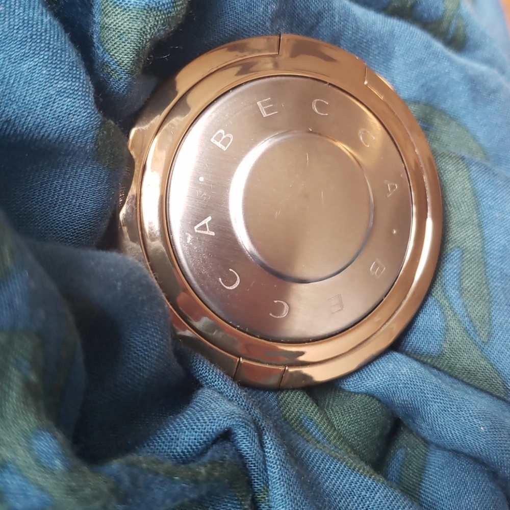 Becca highlighter for face and eyes